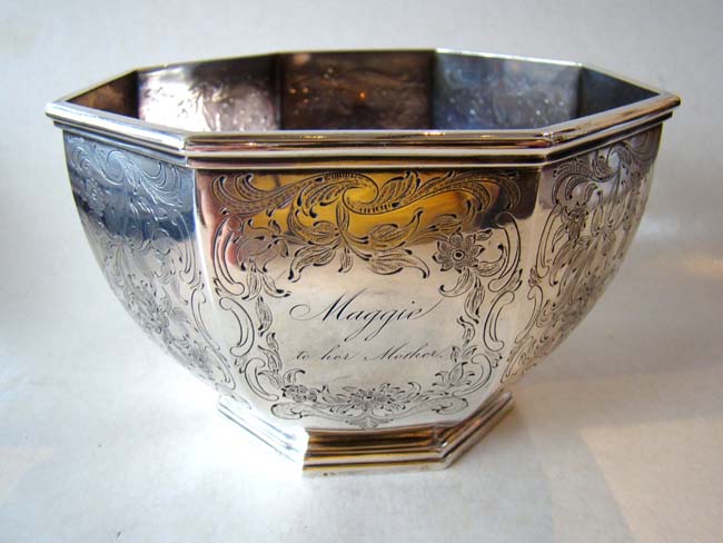 A large 19th century engraved coin silver sugar bowl inscribed “Maggie to her Mother“